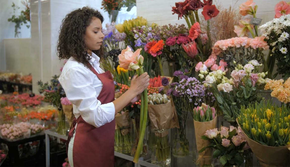 Florist in a flower shop Florist in a flower shop