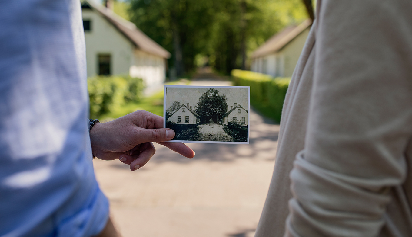 People holding a photo People holding a photo