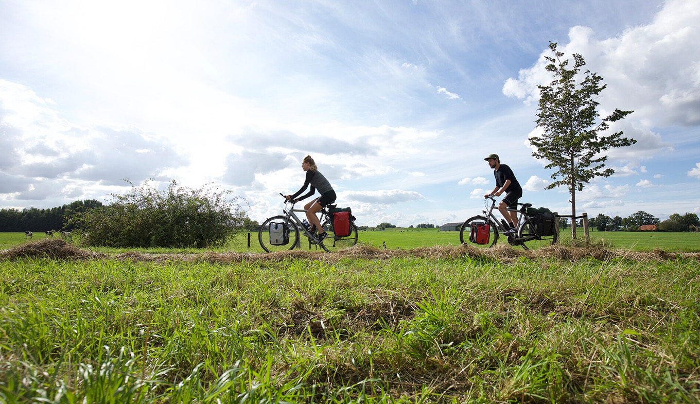 Couple on cycling vacation through the Netherlands Couple on cycling vacation through the Netherlands