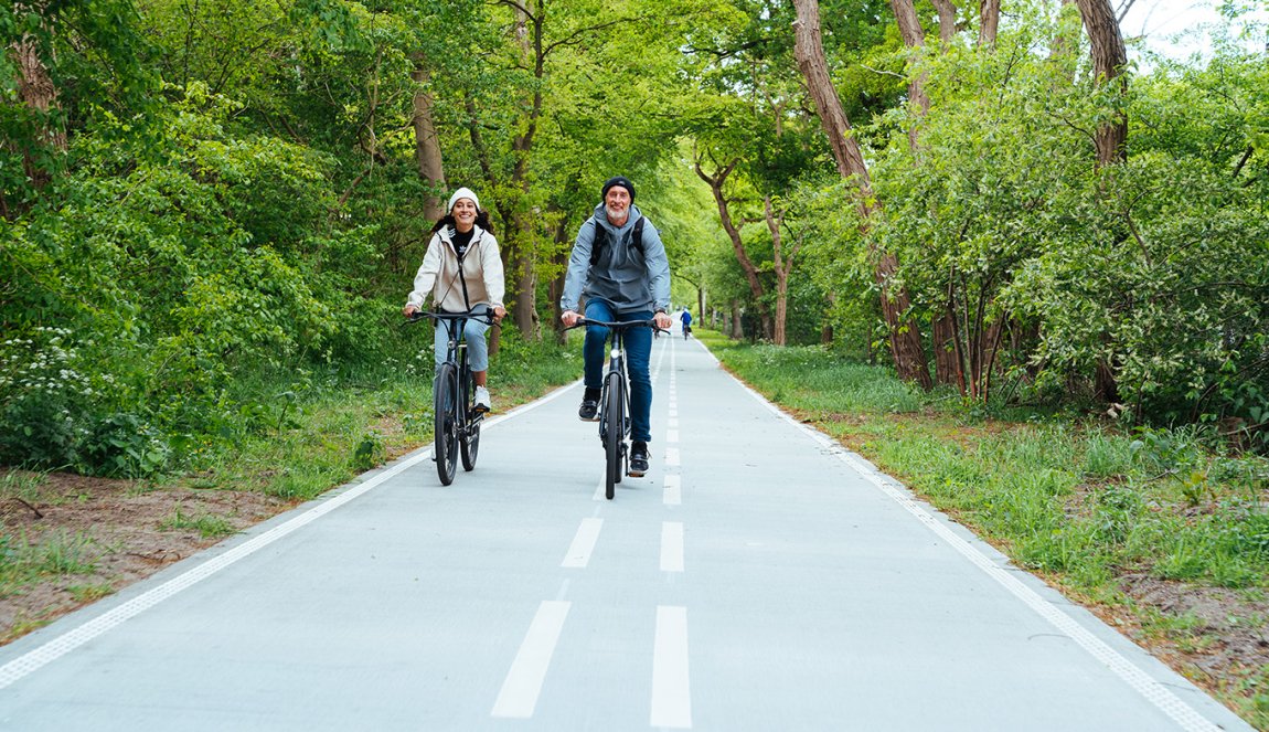 Cyclists on smooth wide bike path Cyclists on smooth wide bike path