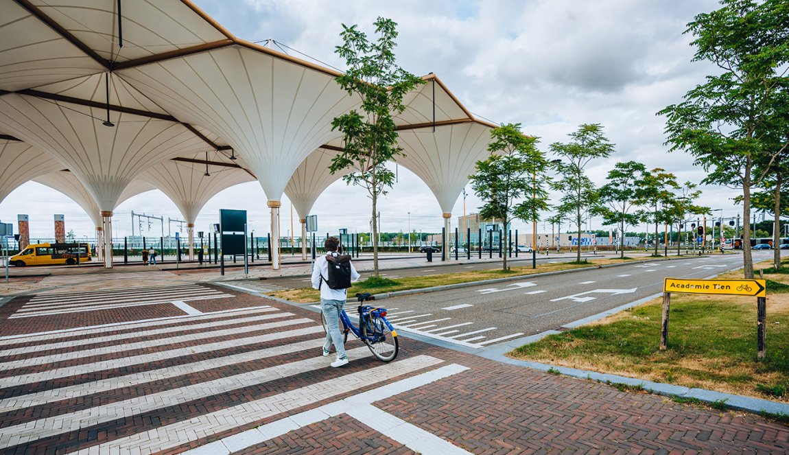 Utrecht Leidsche Rijn bus terminal with ov bike cyclist Utrecht Leidsche Rijn bus terminal with ov bike cyclist