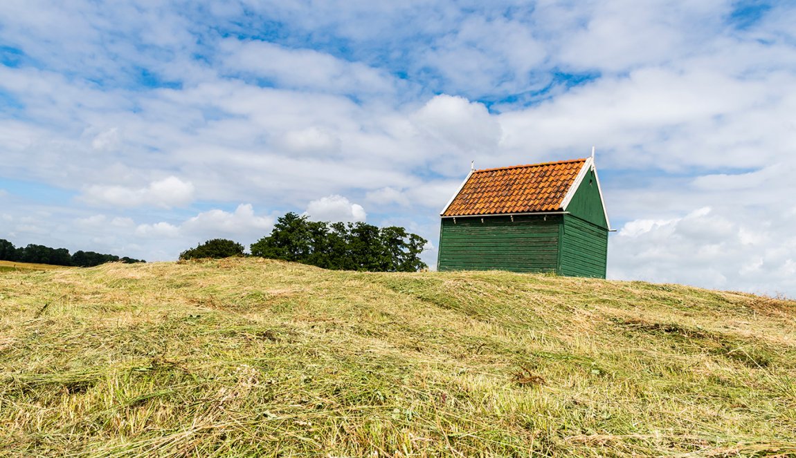Wooden, green house on Schokland, Flevoland Wooden, green house on Schokland, Flevoland