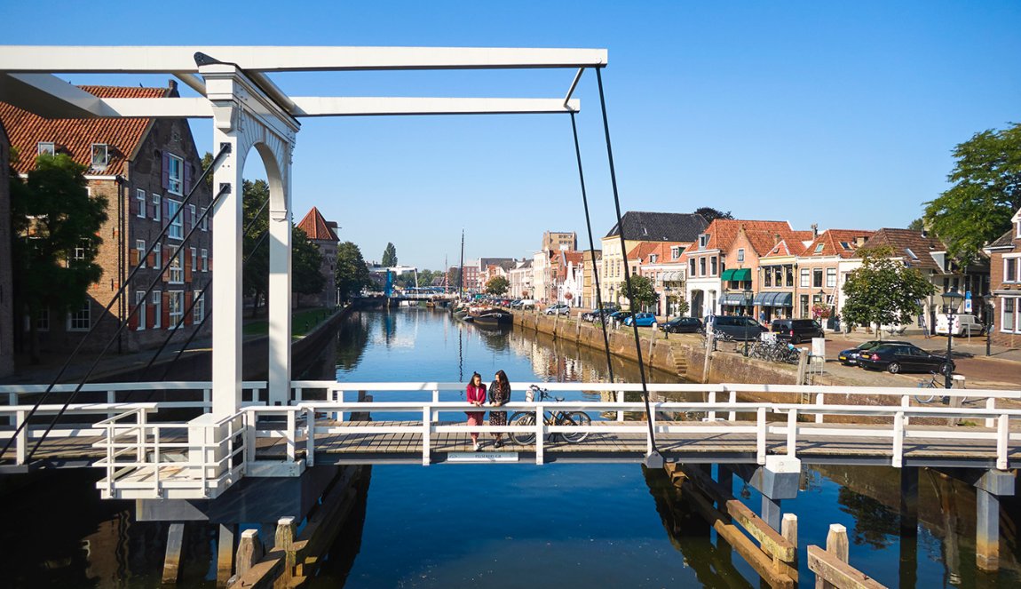Hanseatic city of Zwolle ladies on Pelserbrug over Thorbeckegracht Hanseatic city of Zwolle ladies on Pelserbrug over Thorbeckegracht