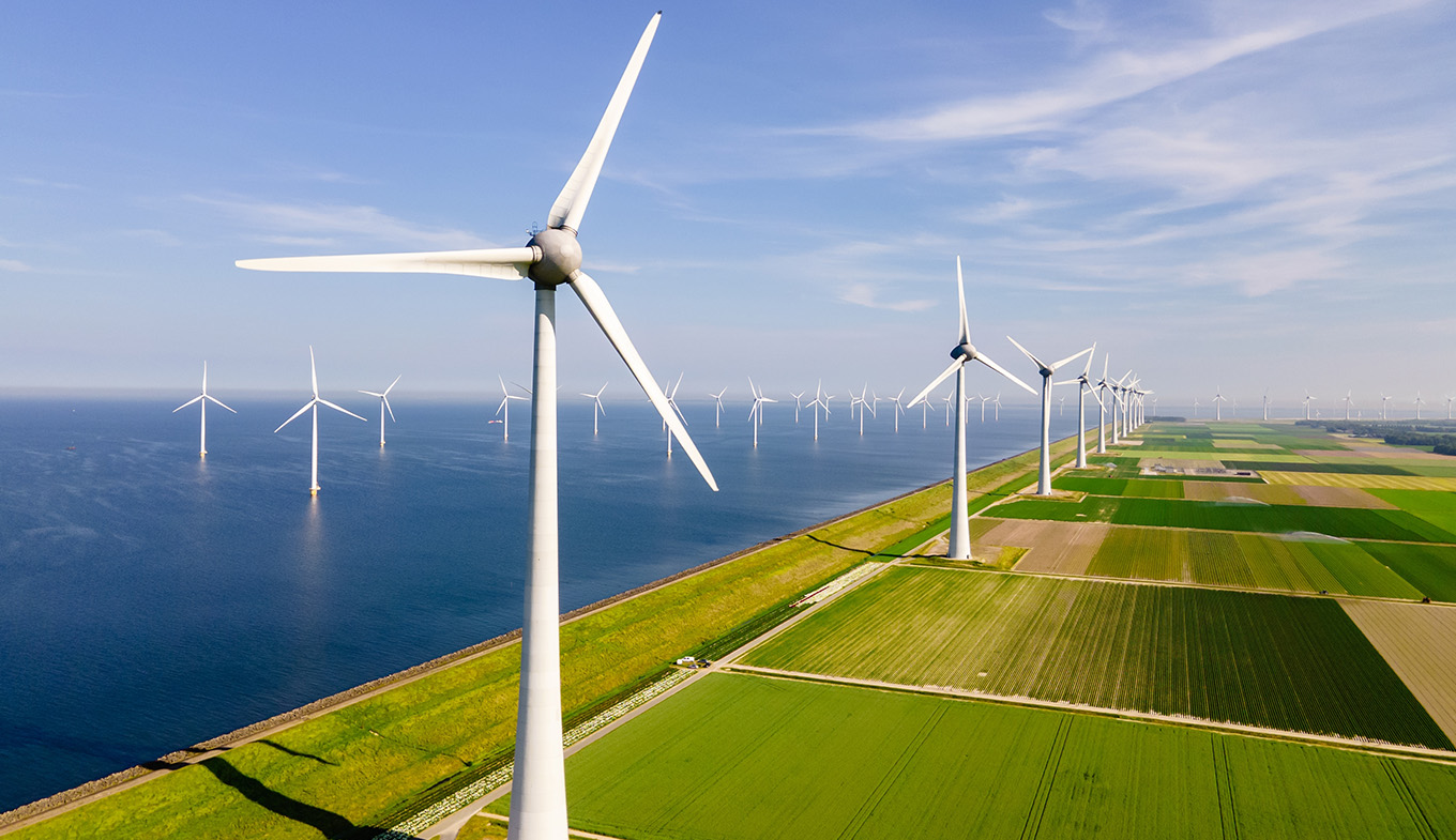 Windmills turbines generating electricity, green energy the Netherlands Windmills turbines generating electricity, green energy the Netherlands