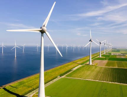 Windmills turbines generating electricity, green energy the Netherlands Windmills turbines generating electricity, green energy the Netherlands