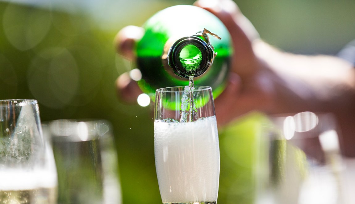Pouring sparkling wine Pouring sparkling wine
