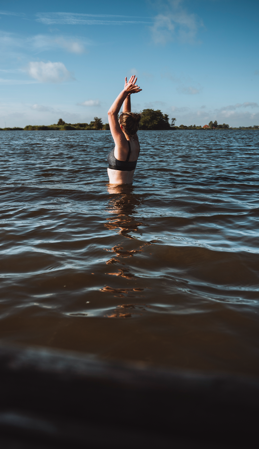 Girl swimming in a lake Girl swimming in a lake